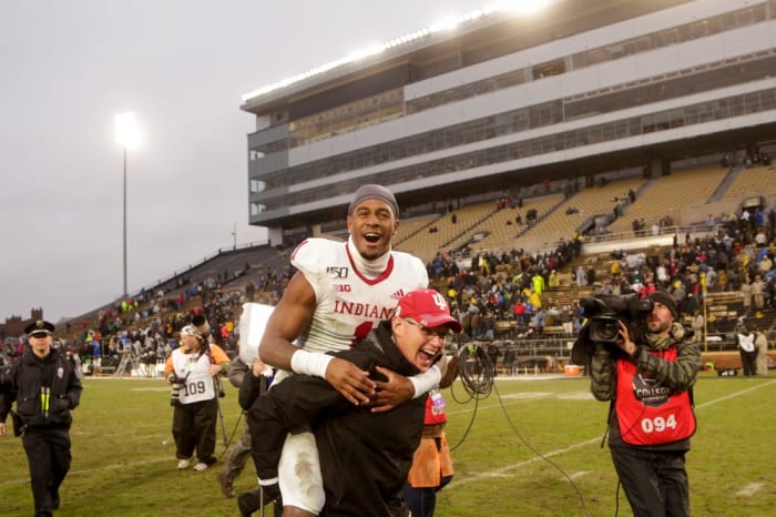 Indiana head coach Tom Allen carries Indiana wide receiver Whop Philyor (1) across the field after defeating Purdue, 44-41 in double overtime to win the Old Oaken Bucket, Saturday, Nov. 30, 2019 at Ross-Ade Stadium in West Lafayette.
